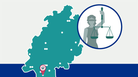 Justizvollzugsanstalt Darmstadt Grafik: Umriss des Landes Hessen mit Markierung der Lage der Justizvollzugsanstalt, daneben die Silhouette einer Justitia in einem Kreis.
